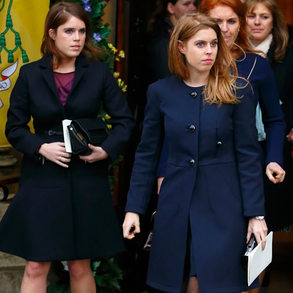Sarah Ferguson, Duchess of York and her daughters Princess Eugenie and Princess Beatrice attend a memorial service for Miles Frost at the Arundel Cathedral 