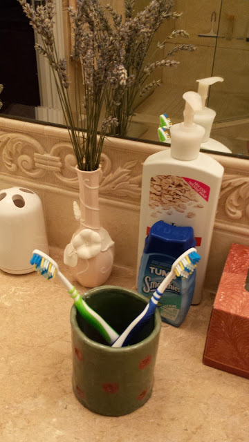 ceramic cup as toothbrush holder