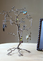 https://www.etsy.com/listing/104227869/jewelry-tree-stand-bronze-earring