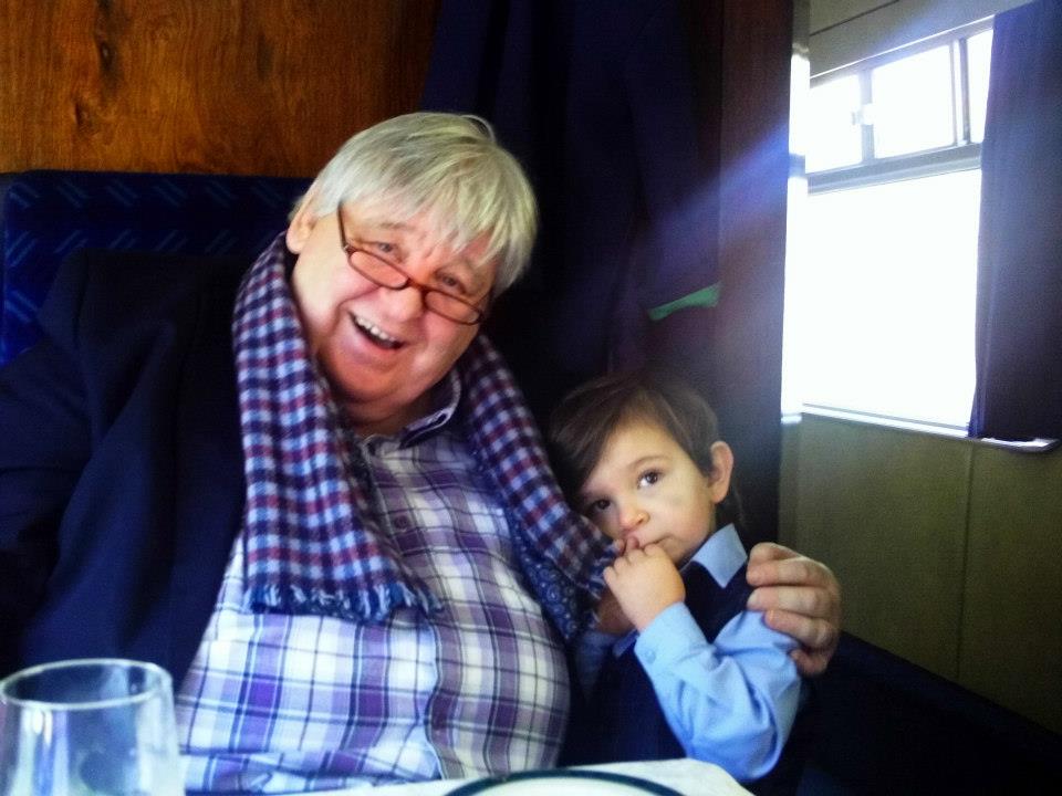 BRIAN AND ONE OF HIS THIRTEEN GRANDCHILDREN