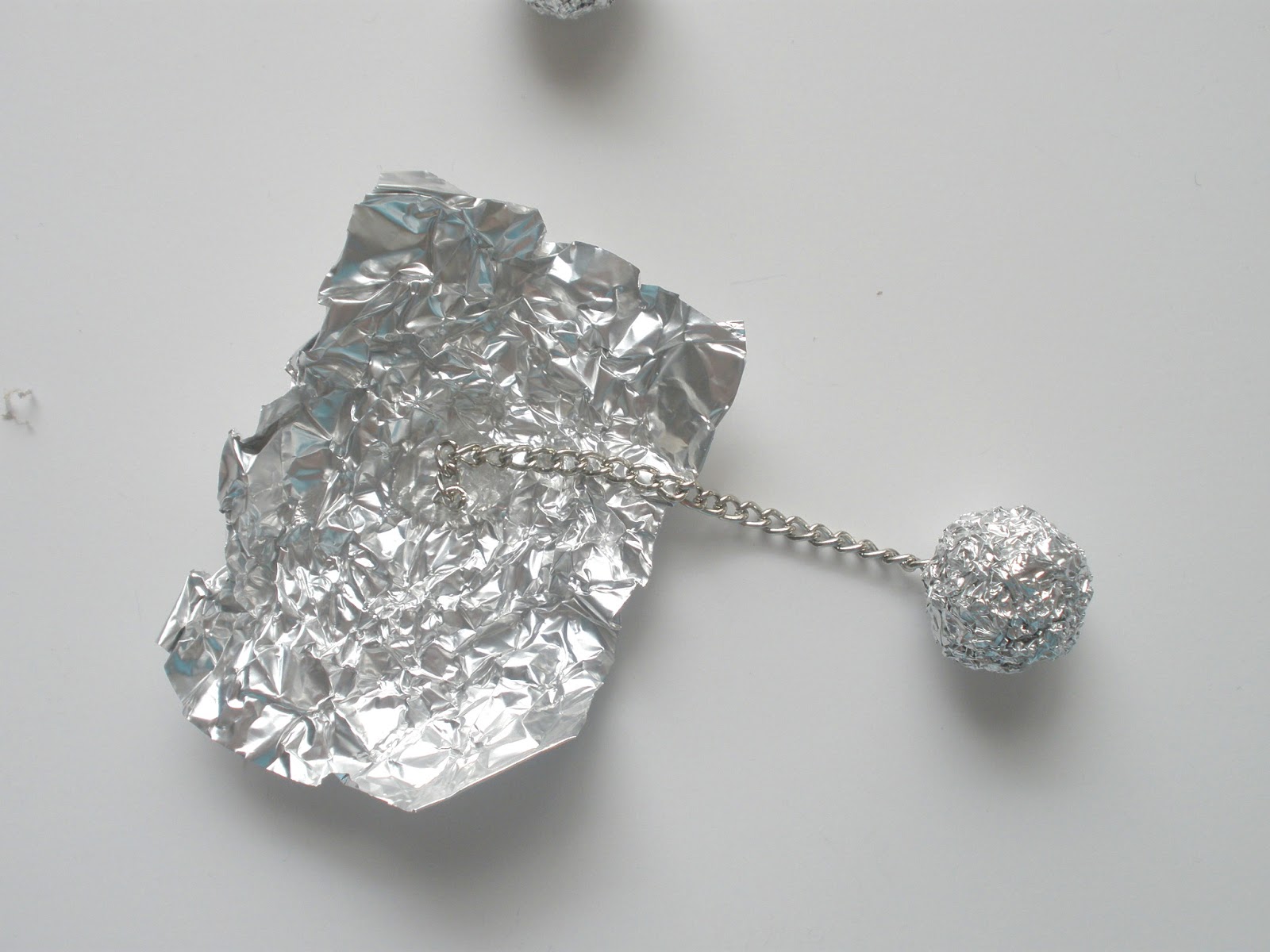 handmade by stacy vaughn tin foil earings