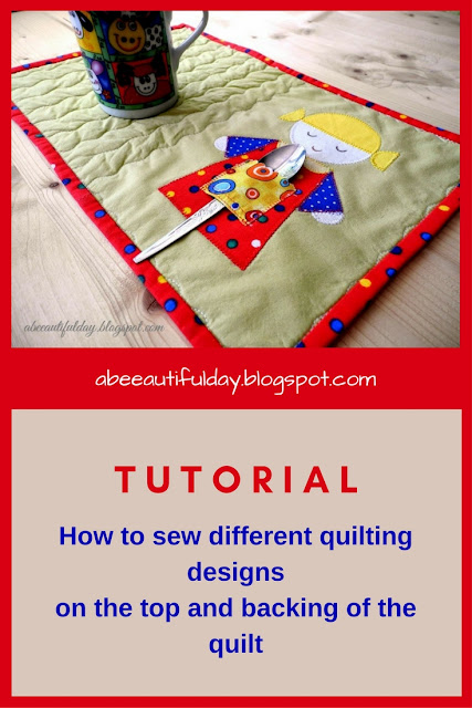 Different quilting designs on the top and backing of the quilt-tutorial-abeeautifulday.blogspot.com