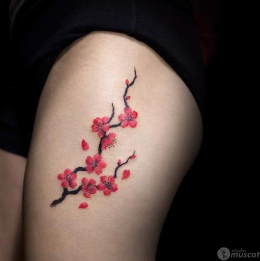 Este lindo coxa tat