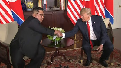 Kim Jung Un and Donald Trump in Singapore