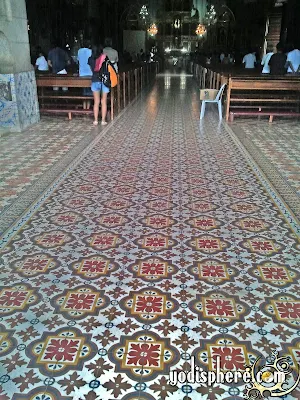 Colorful flower inspires floor tiles used in Nagcarlan Church floors and isle
