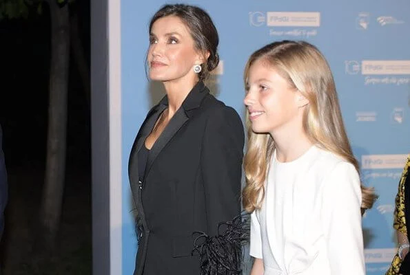 Queen Letizia wore Pertegaz suit, blazer and trousers. Crown Princess Leonor wore and red gold button blazer and skirt, Sofia wore white dress