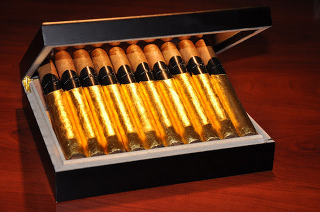 ROLLED GOLD CIGARS MADE WITH BOURBON AND GOLD