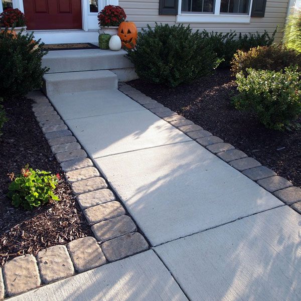 Custom Stoneworks & Design Inc. Paver Border around existing concrete