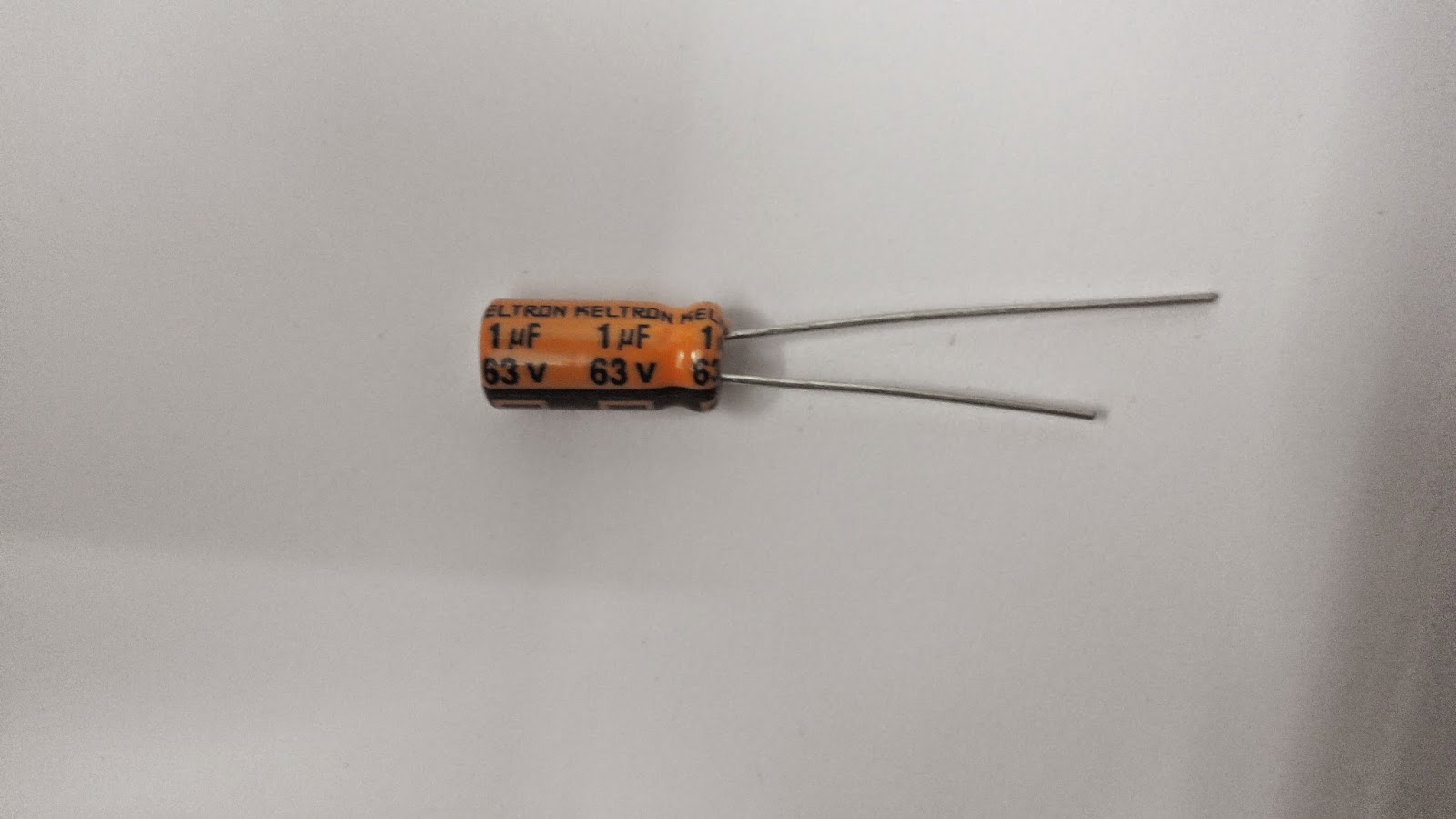 . 1 MFD / 63 VDC, 85' C, 5x11mm, SA SERIES RADIAL LEAD CAPACITOR KELTRON