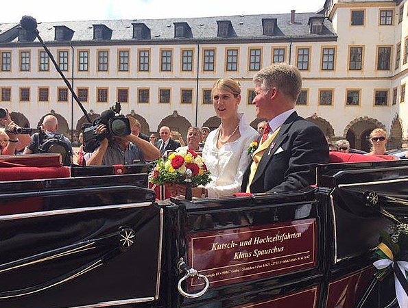 Princess Stephanie of Saxe-Coburg and Gotha wore a white silk wedding dress from German fashion designer Gordon Sieverding, who is based in Michelau