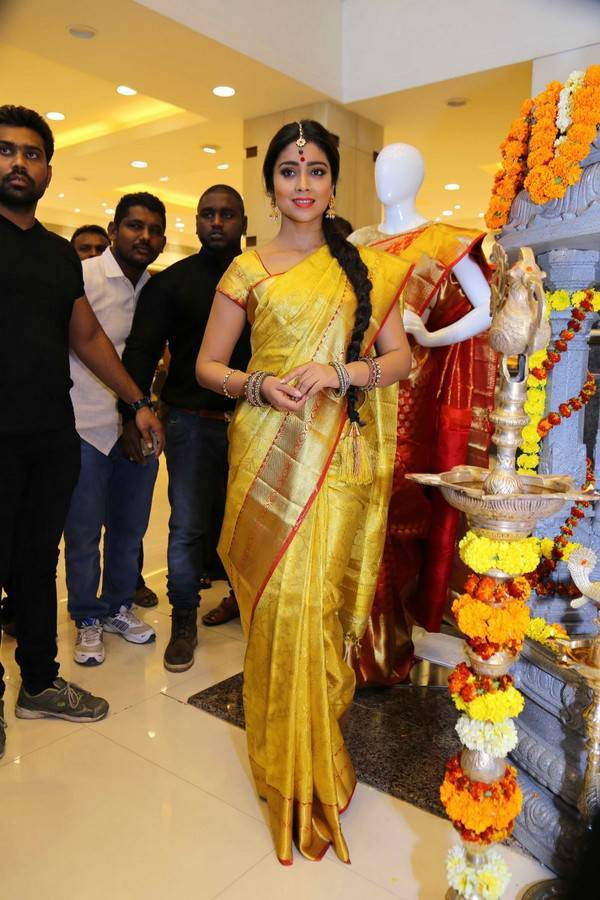 Indian Actress Shriya Saran Long Hair In Traditional Yellow Saree At Showroom Launch