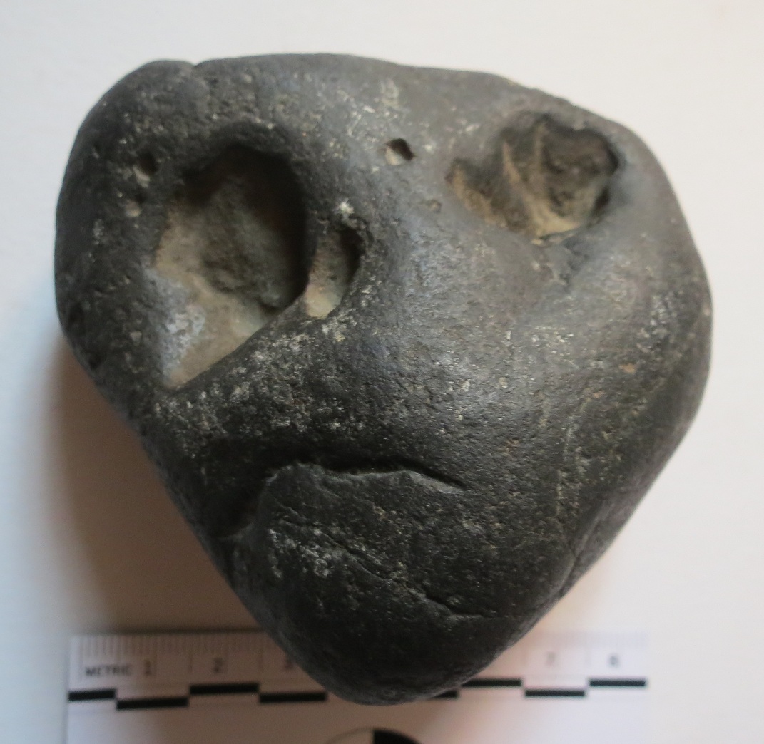 Archaeology of Portable Rock Art Rock in context of multiple "pebble