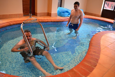 Jason Miller with his body support pool access system