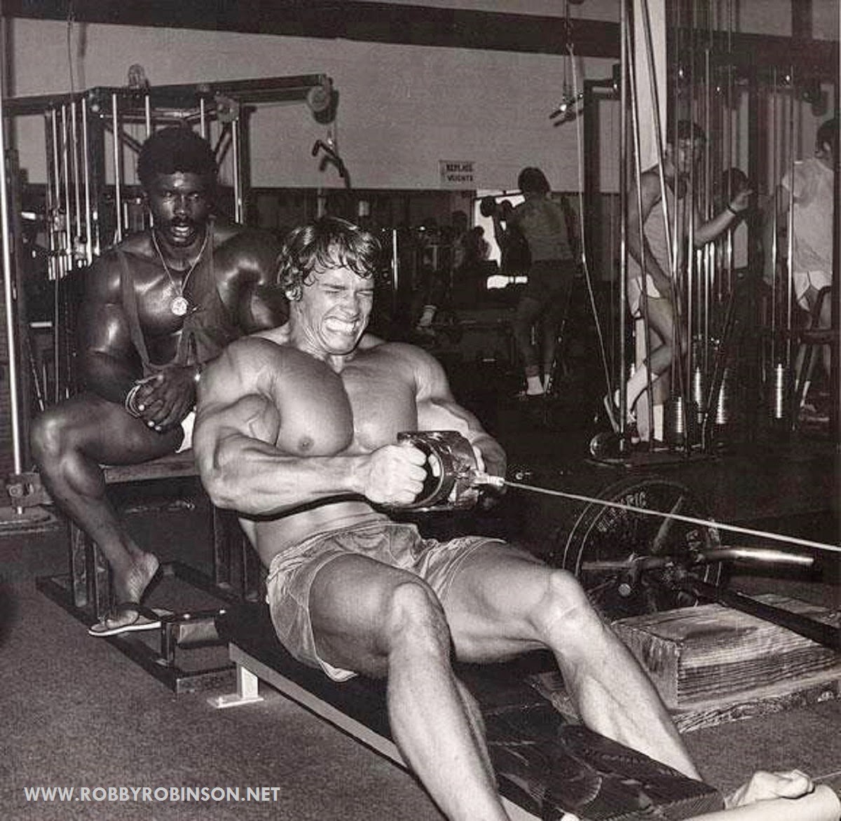 Robby Robinson and Arnold Schwarzenegger training during  filming of bodybuilding cult movie Pumping Iron at Golds's in 1975 ● www.robbyrobinson.net/dvd_built.php ● 