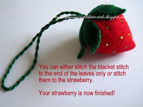 Felt strawberry finishing tutorial showing how to make this strawberry trimmed with gold beads