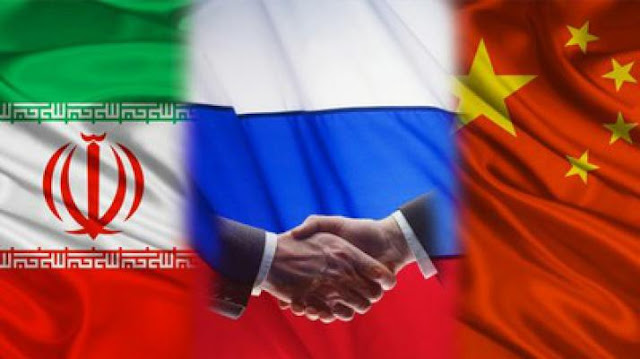 From words to deeds: Tehran-Beijing-Moscow Axis changes everything Hands