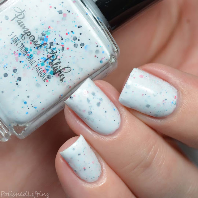 white crelly nail polish with glitter