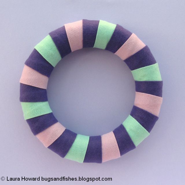 covering the wreath base with felt strips