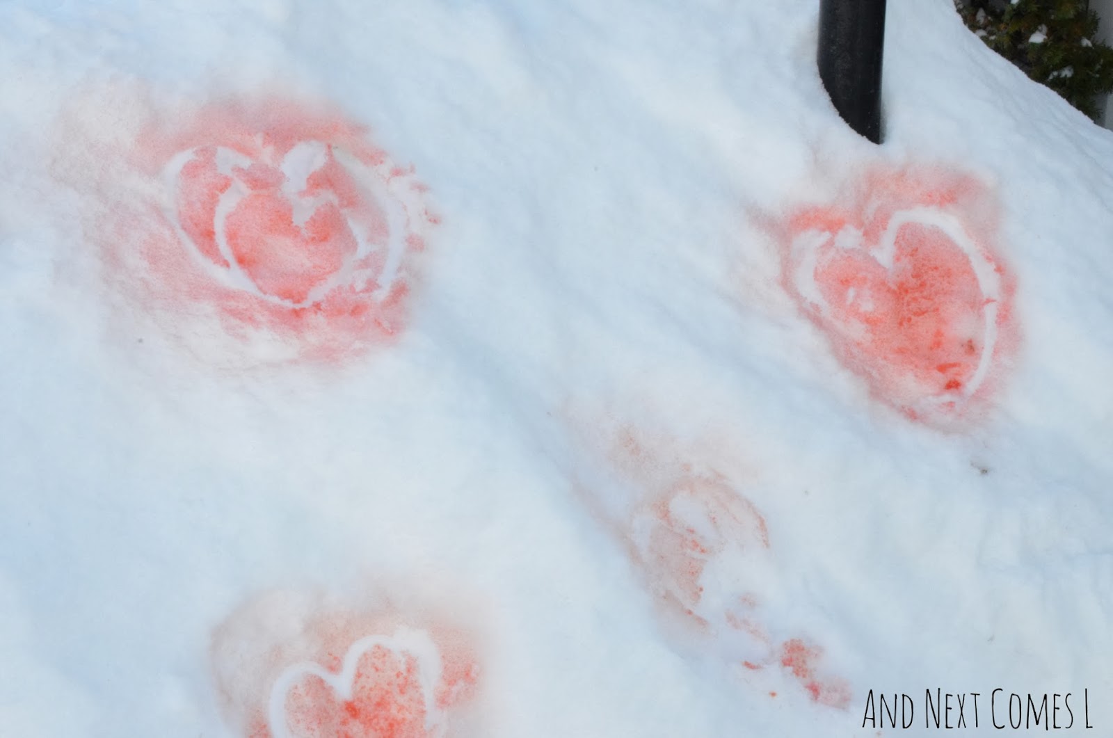 Painting hearts in the snow