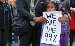 Little girl holds 'We are the 99-percent' sign