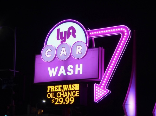 Lyft Car Wash retro neon sign at night Lyft Car Wash retro neon sign night