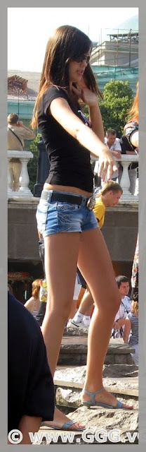 Skinny girl wearing micro jeans shorts