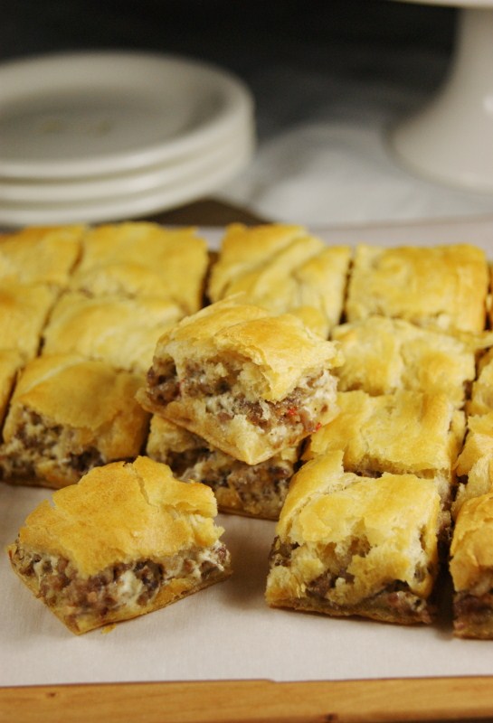 Prepping the cream cheese and sausage filling in Pillsbury Crescent dough  sheets - The Southerly Magnolia