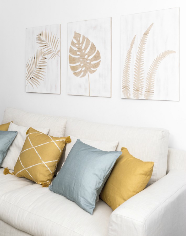 Un apartamento con una decoración natural y fresca