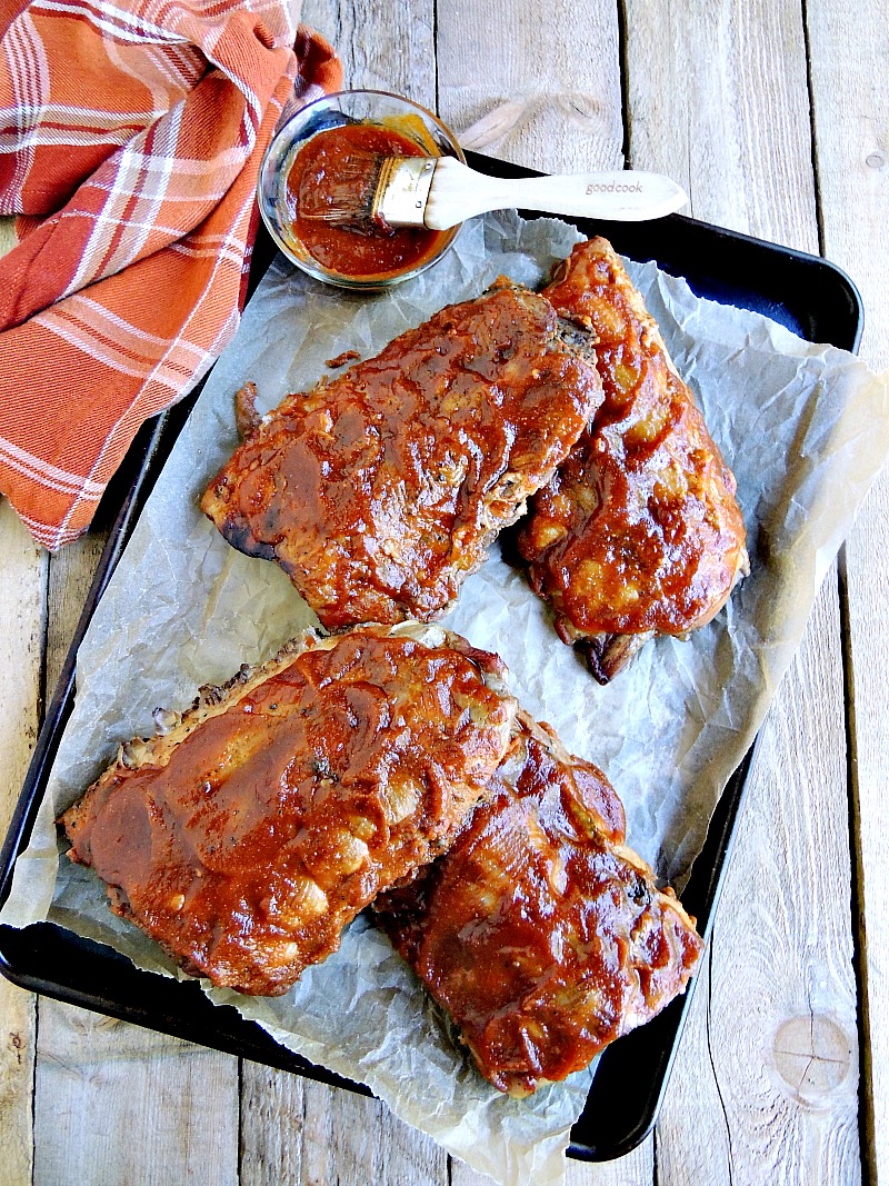 Slow Cooker Pumpkin BBQ Ribs - Pumpkin adds that touch of fall to this delicious slow cooker version of baby back ribs. From www.bobbiskozykitchen.com