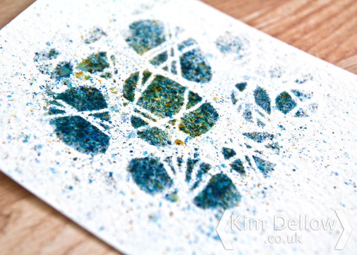 Kim Dellow using a stencil with the PaperArtsy Infusions