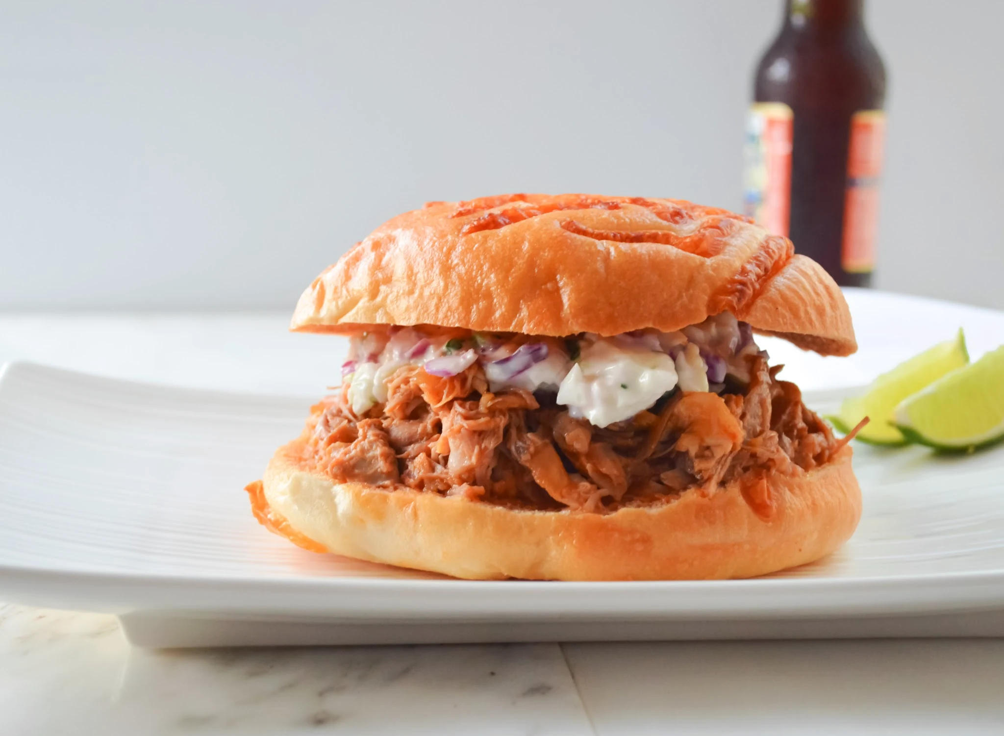 Slow-Cooked-Peach-Bourbon-Bbq-Pulled-Pork-Recipe-Toasted-Bun.jpg