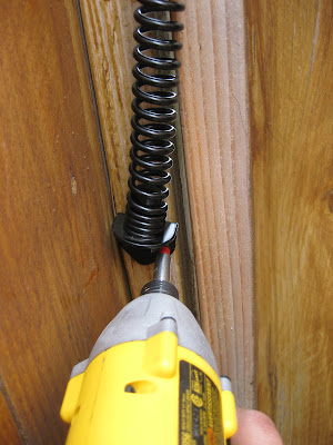 Homeowners and DIYers: Installing a gate spring