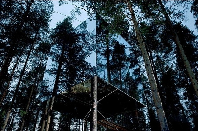  14 Crazy Hotels That Will Give You Serious Travel Goals - The Mirrorcube Tree House Hotel in Sweden is like a hideout in the trees: The entire thing is camouflaged behind mirrored walls.