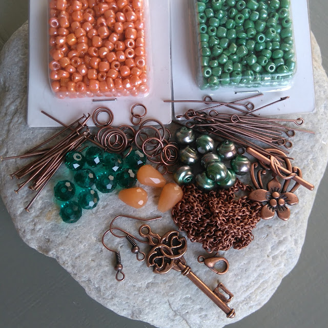 onderdelen Sieraden setje koper met groene en oranje glaskralen