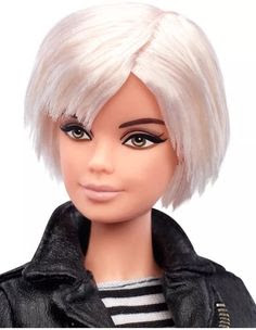 Have you seen her? Mattel's Barbie as Andy Warhol that is? She's adorable...