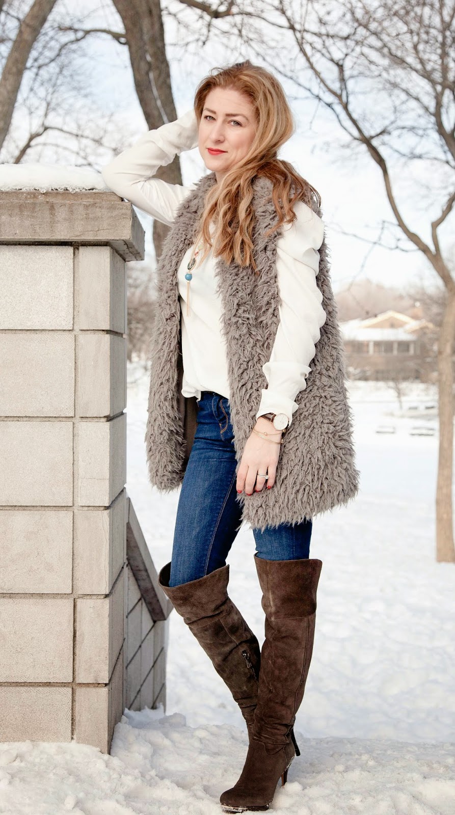 faux fur vest, over the knee high boots
