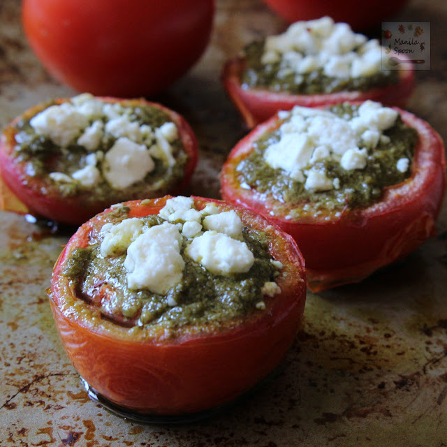 Deliciously good, easy and healthy breakfast or brunch solution - Baked Tomatoes with Pesto and Feta Cheese. Completely gluten-free and low-carb, too! | manilaspoon.com
