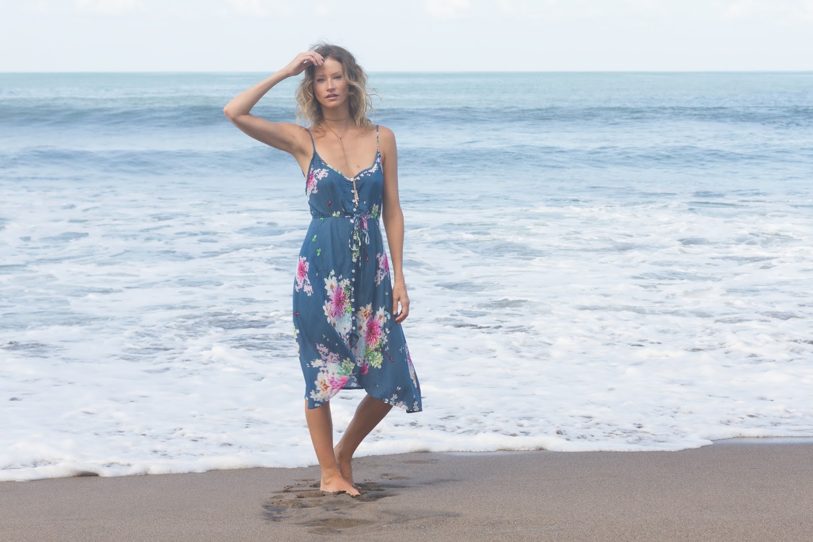 fashion blogger and designer Alison Hutchinson, iswearing a KAYVALYA Jade Dress in Blue Floral