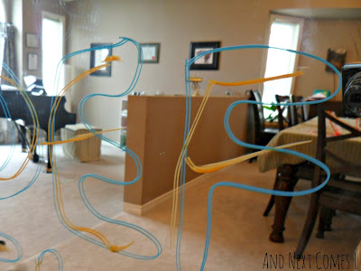 Tracing letters on mirrors with window markers from And Next Comes L