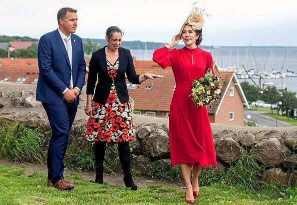 Crown Princess Mary wore Raquel Diniz Armonia silk-georgette dress. Danish flag