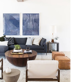 blue grey sofa wallart natural side table