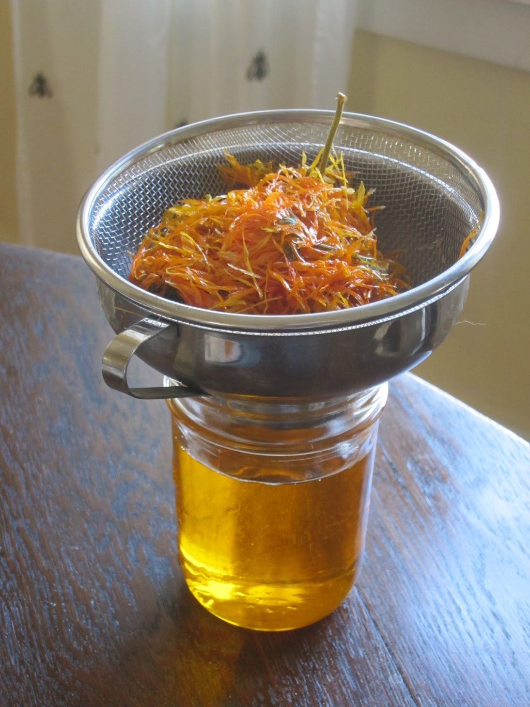 How To Make A Calendula Oil Infusion Root Simple how-to-make-a-calendula-oil-infusion-root-simple