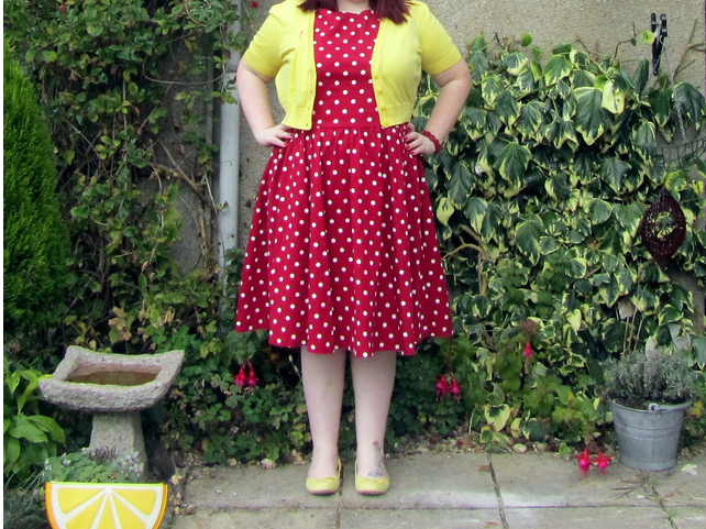 yellow dress with red polka dots