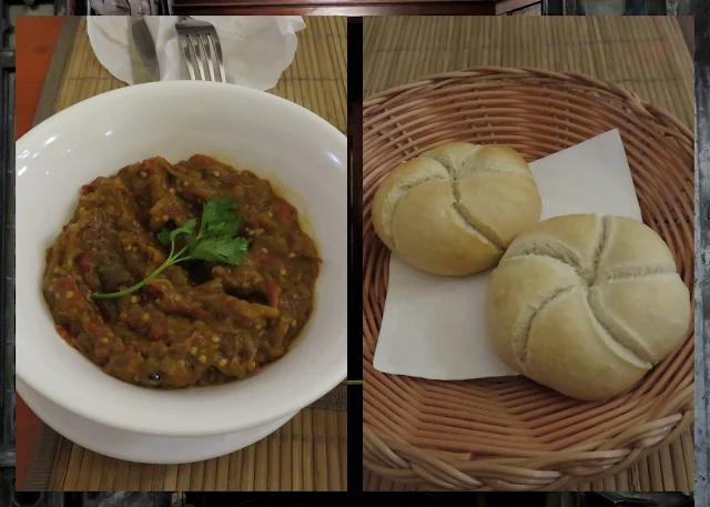 Eggplant dip and kaiser rolls in Bucharest, Romania