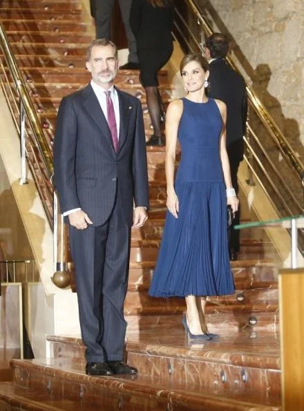 Queen Letizia Carolina Herrera top and skirt at Princess of Asturias Awards concert. white gold diamond earring