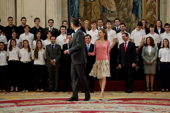 Queen Letizia wore Hugo Boss skirt and blouse