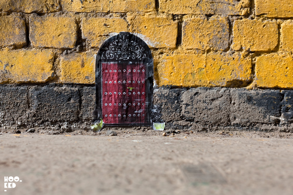Miniature Street Art door by Mexican artist Pablo Delgado