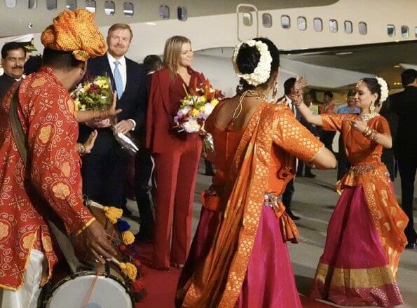 Dutch Queen Maxima wore Claes Iversen red Laperm classic blazer and red Lykoi trousers and red Korat silk blouse