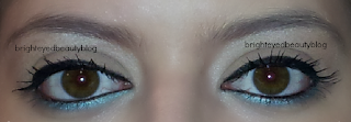 A pop of teal in an otherwise everyday eye look