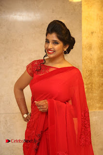 Actress Shyamala Stills in Red Saree at Okkadochadu Movie Audio Launch  0341